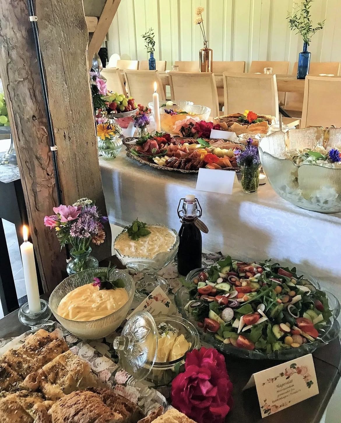 Buffet table with salads and bread