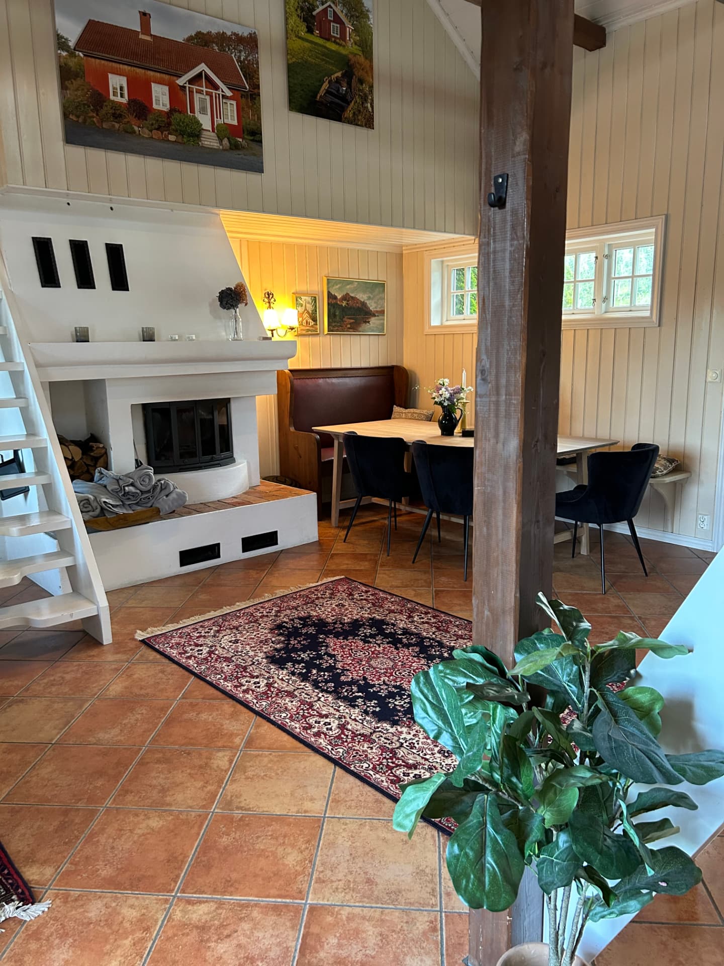 Living room with a wood-burning stove and sofa