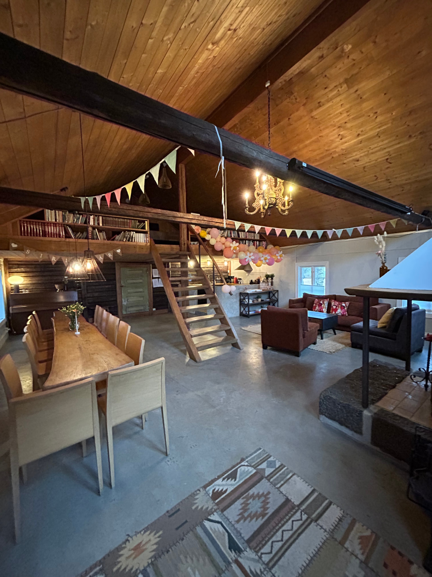 The hall with long tables and bunting