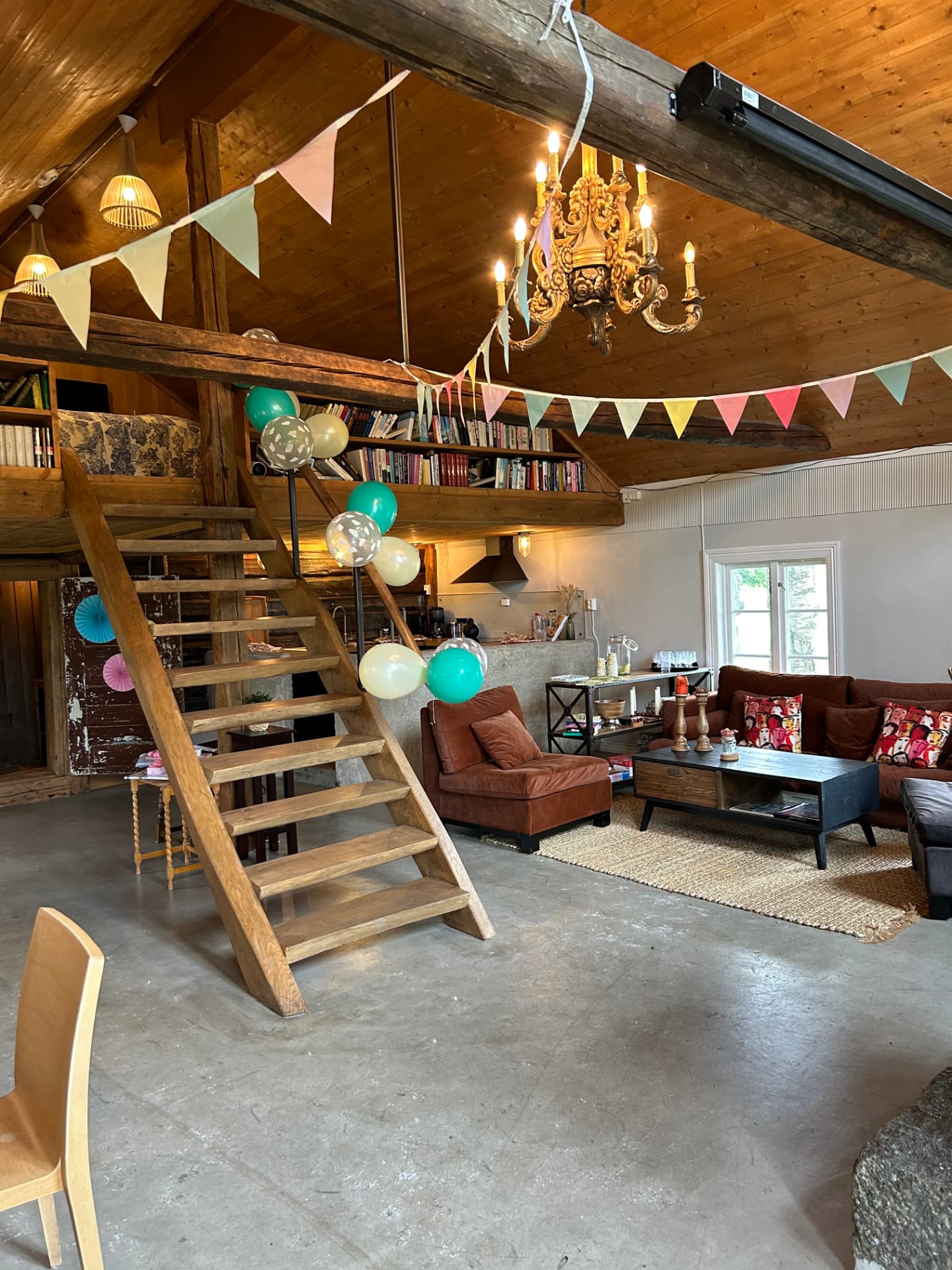 The hall decorated with bunting and balloons