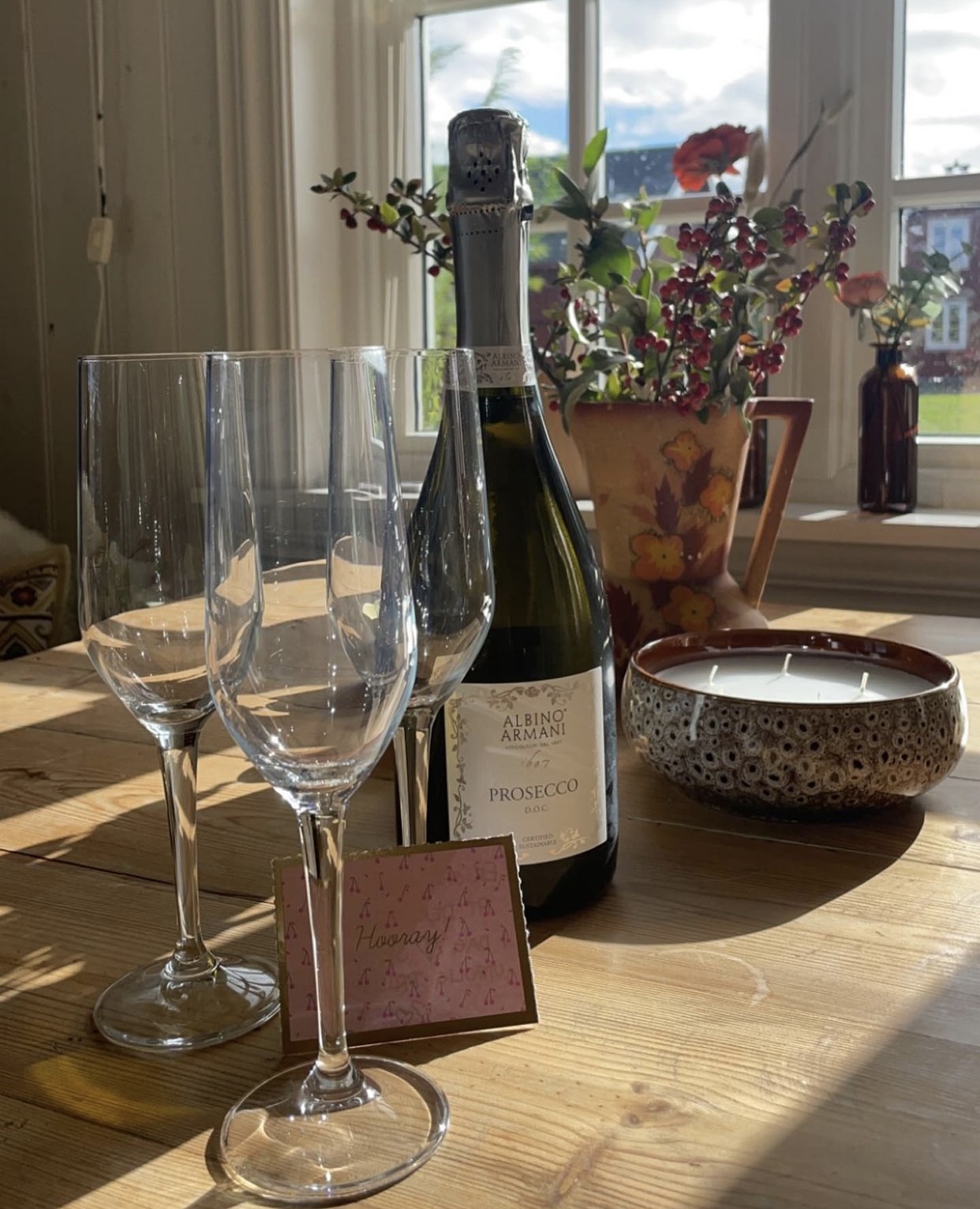 Prosecco and glasses on the wooden table
